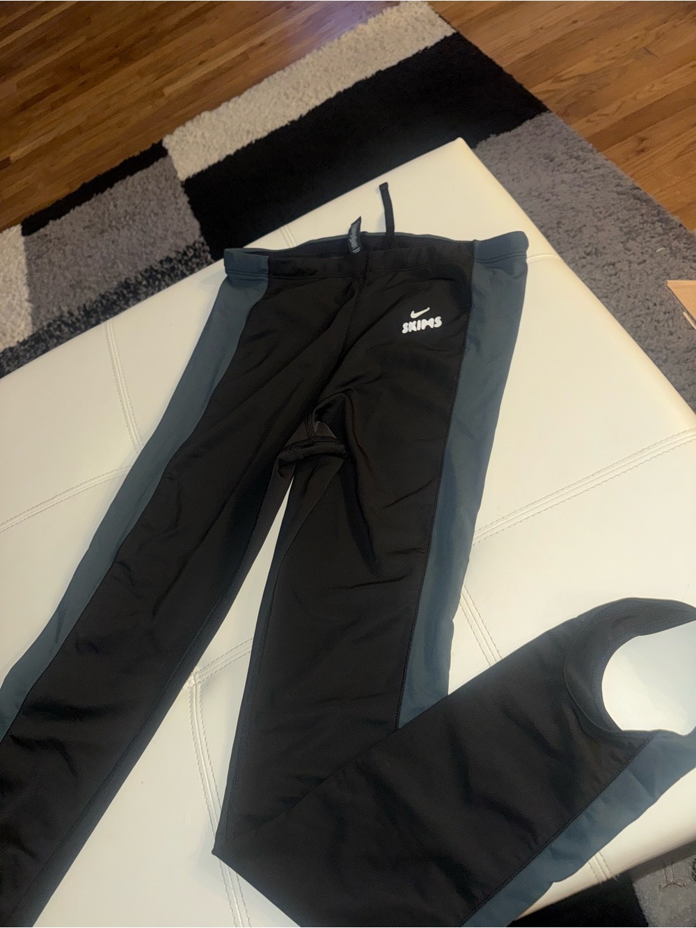 Nike skims Black Track Pants with Dark Gray Side Stripes